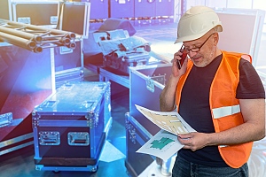 male construction worker on phone with lawyer