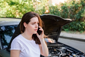 women involved in a hit and run calling her insurance provider