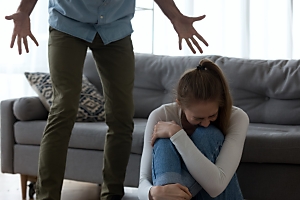 man emotionally abusing woman