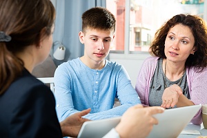 mother and son talking to personal insurance dispute lawyer