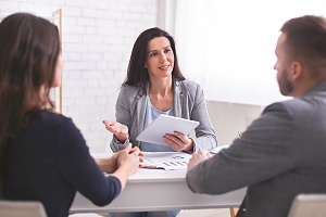 women contract law attorney reviewing clients case in an office