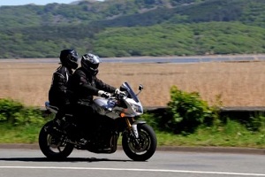 rider and passenger in bike