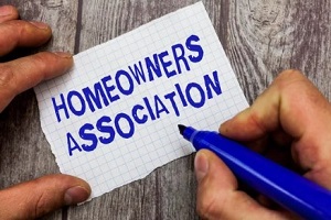 man writing homeowner association
