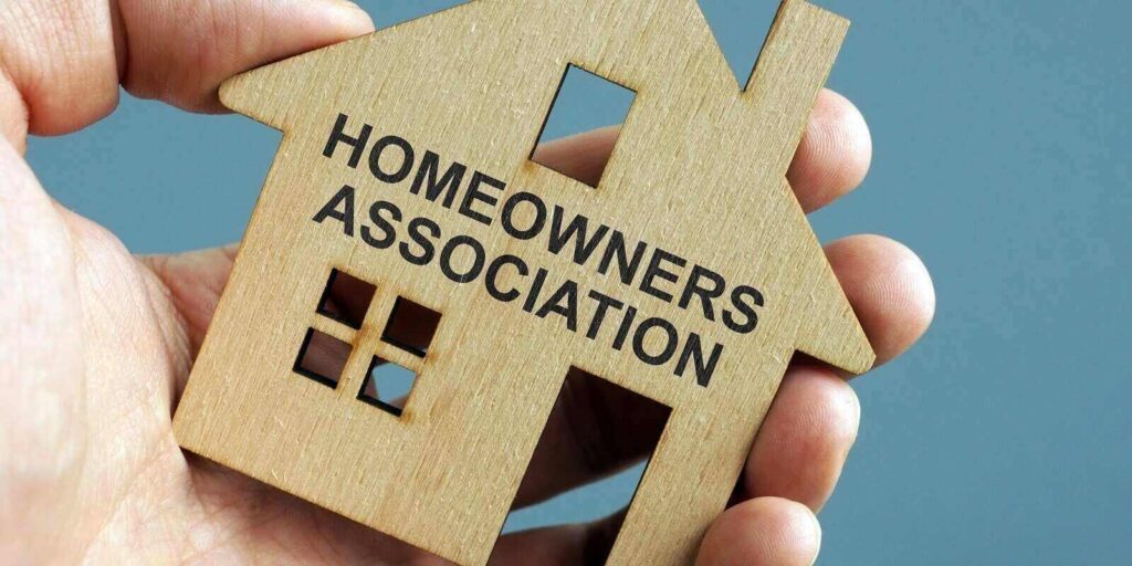 California homeowners association hoa written on a model of home