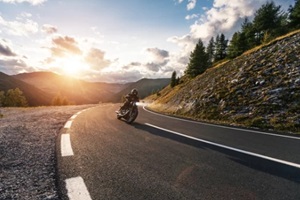 LA, California motorcycle driver riding in alpine road